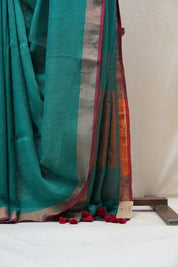 Green Plain Linen Saree With Red Tassels - SRGPLS284
