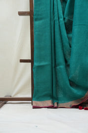 Green Plain Linen Saree With Red Tassels - SRGPLS284