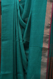Green Plain Linen Saree With Red Tassels - SRGPLS284