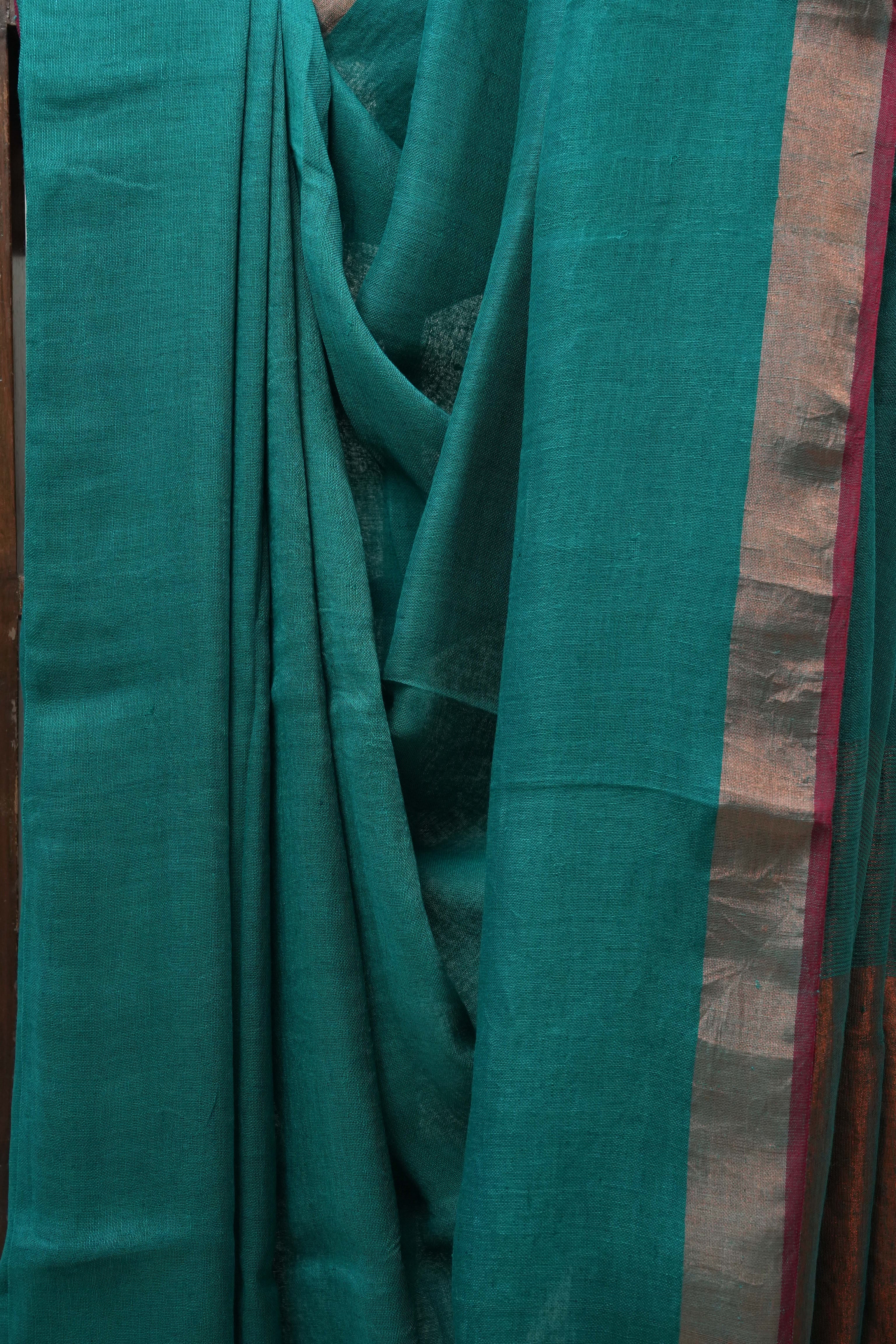 Green Plain Linen Saree With Red Tassels - SRGPLS284