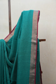 Green Plain Linen Saree With Red Tassels - SRGPLS284