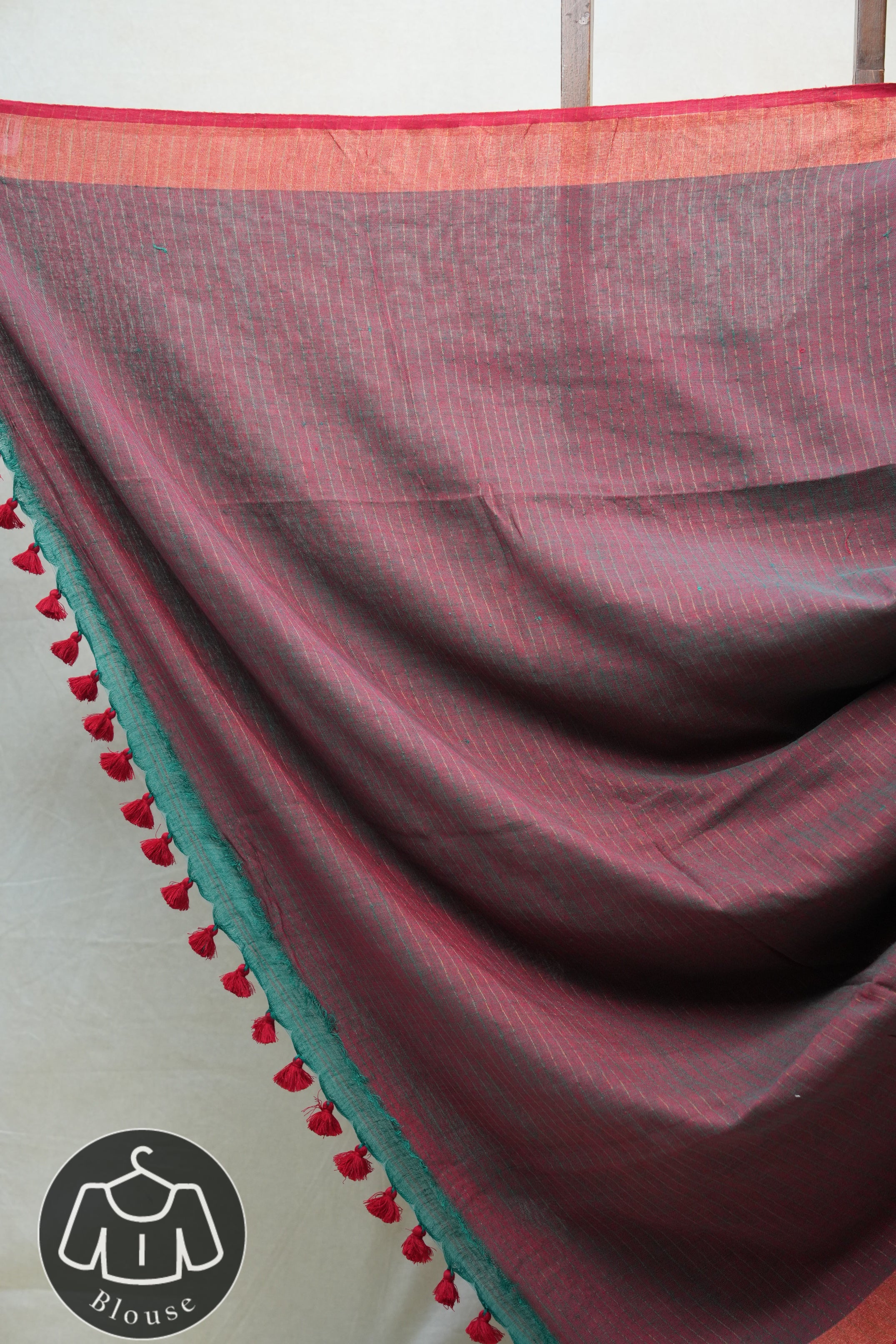 Green Plain Linen Saree With Red Tassels - SRGPLS284