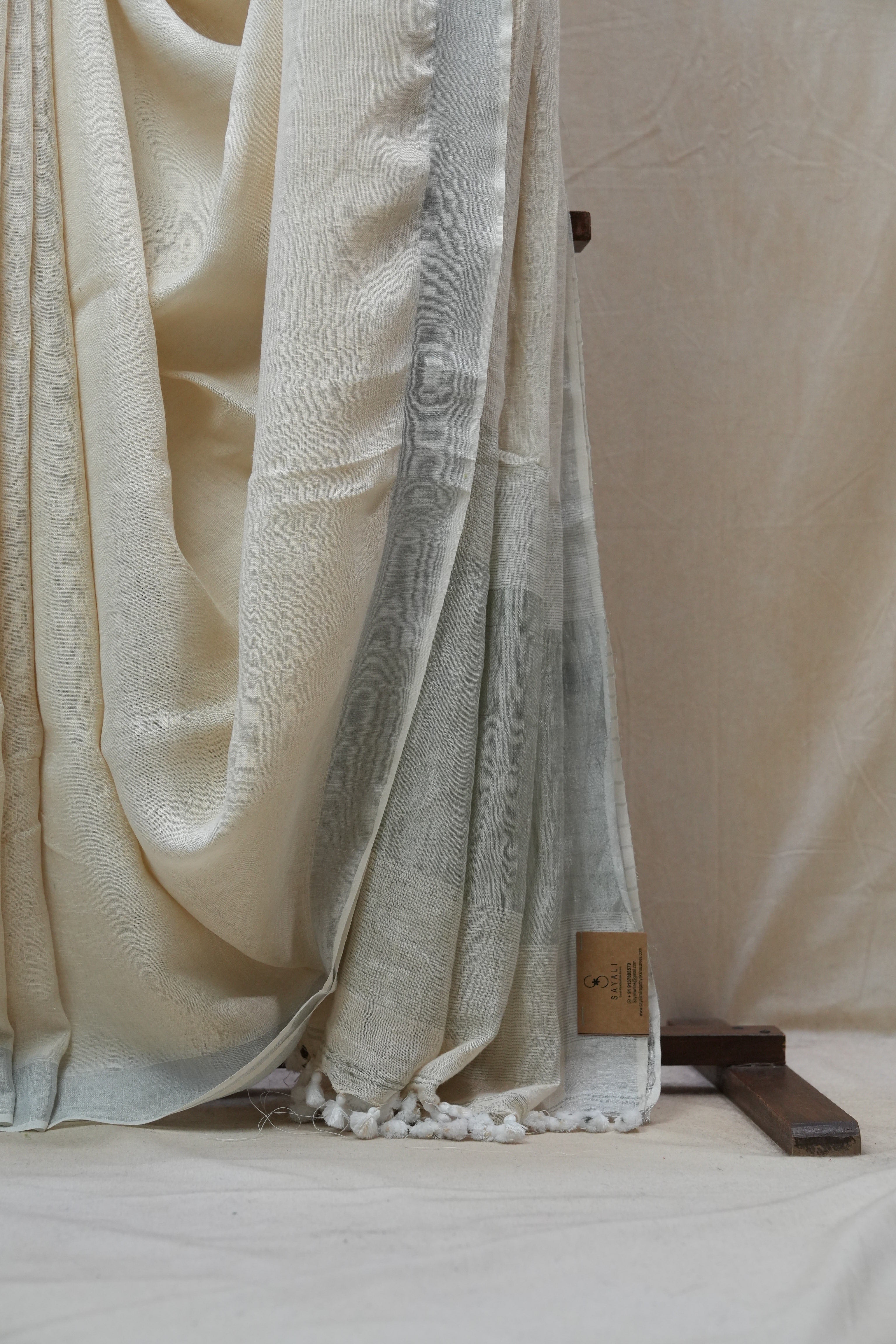 Off White  Plain Linen Saree With White Tassels - SROWPLS296