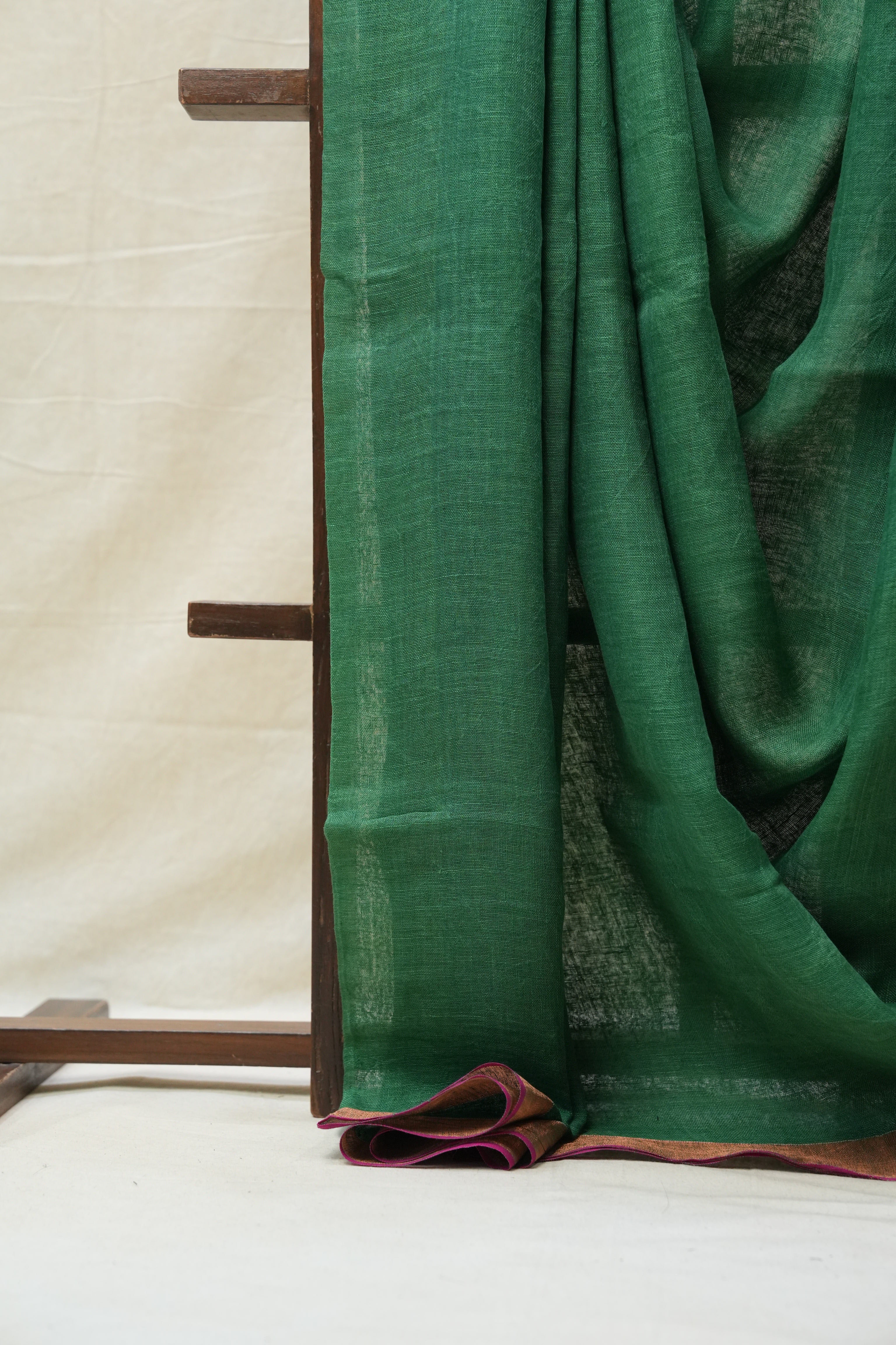 Green Plain Linen Saree With Pink Tassels - SRGPLS292