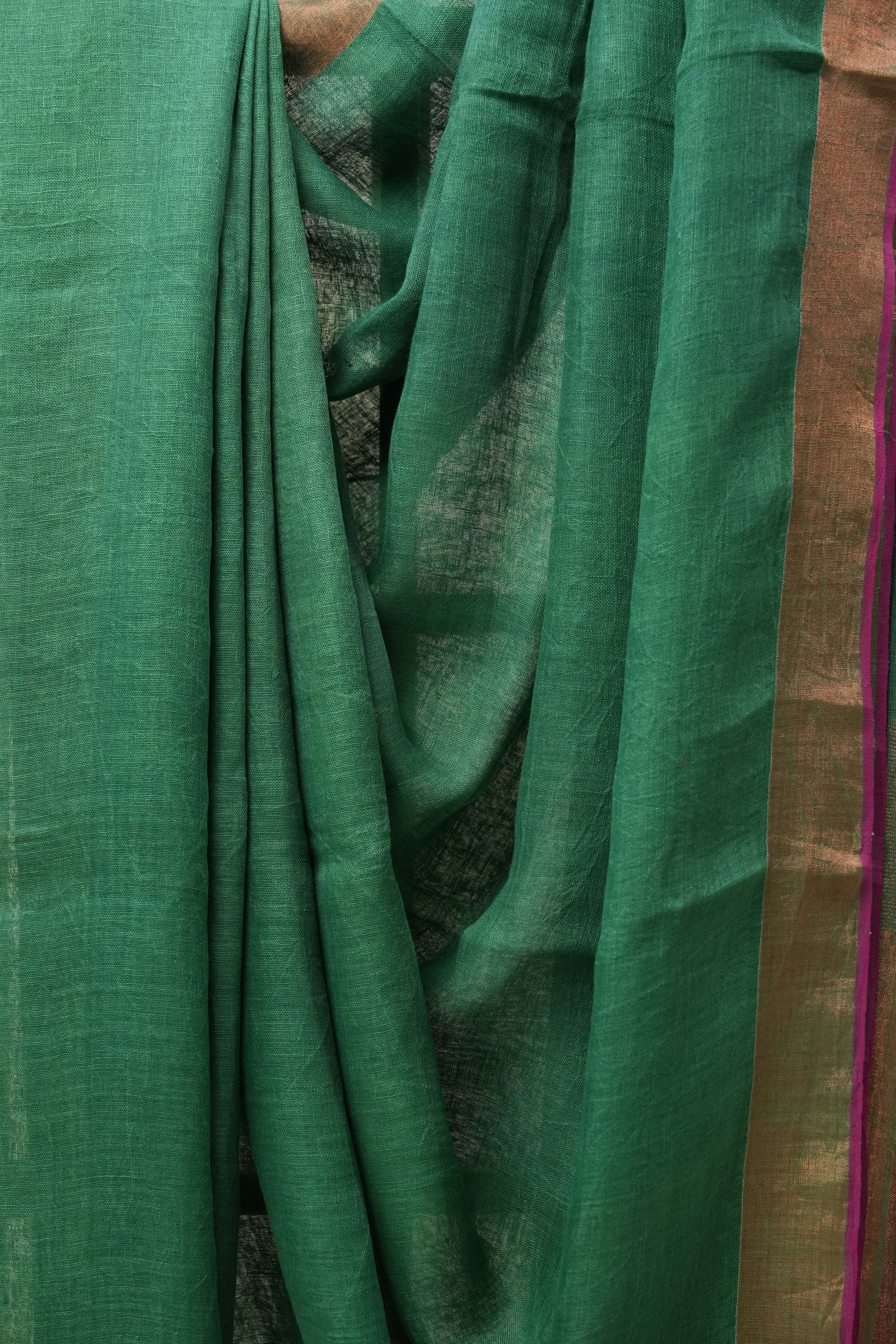Green Plain Linen Saree With Pink Tassels - SRGPLS292
