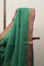 Green Plain Linen Saree With Pink Tassels - SRGPLS292