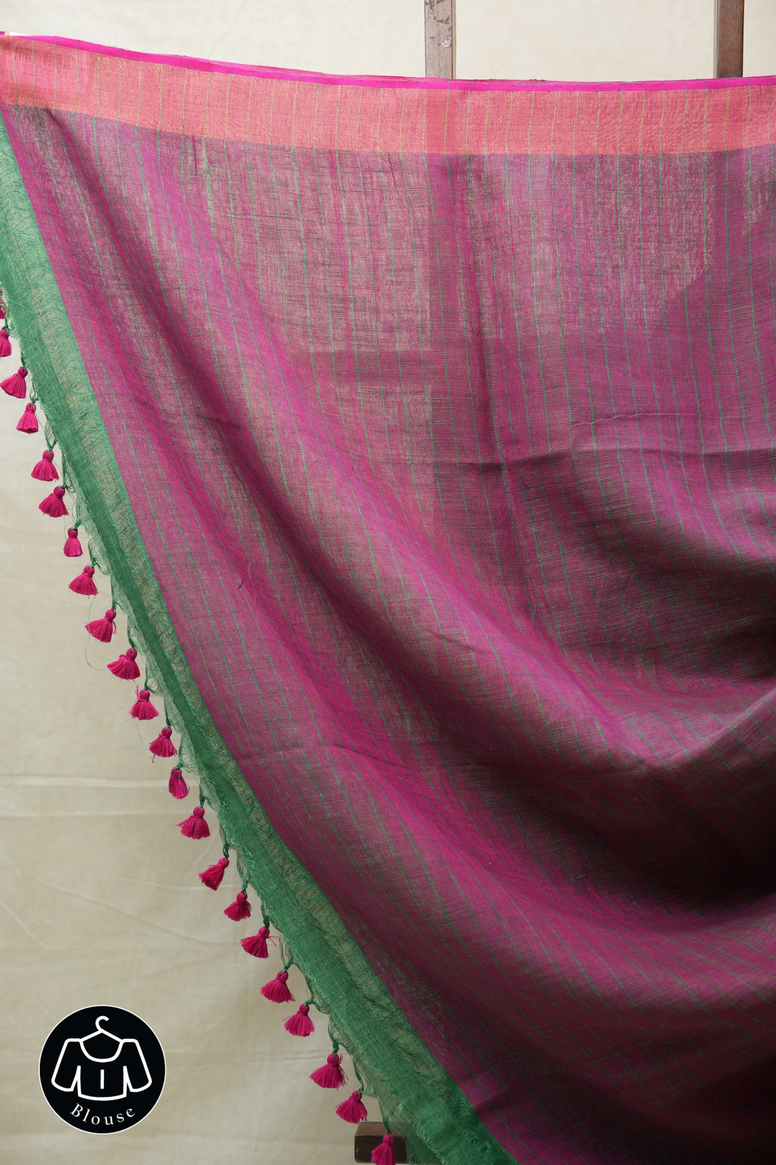 Green Plain Linen Saree With Pink Tassels - SRGPLS292