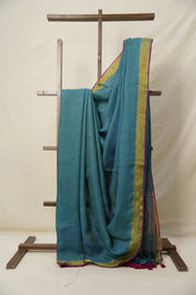 Peacock Green Plain Linen Saree With Pink Tassels - SRPGPLS341