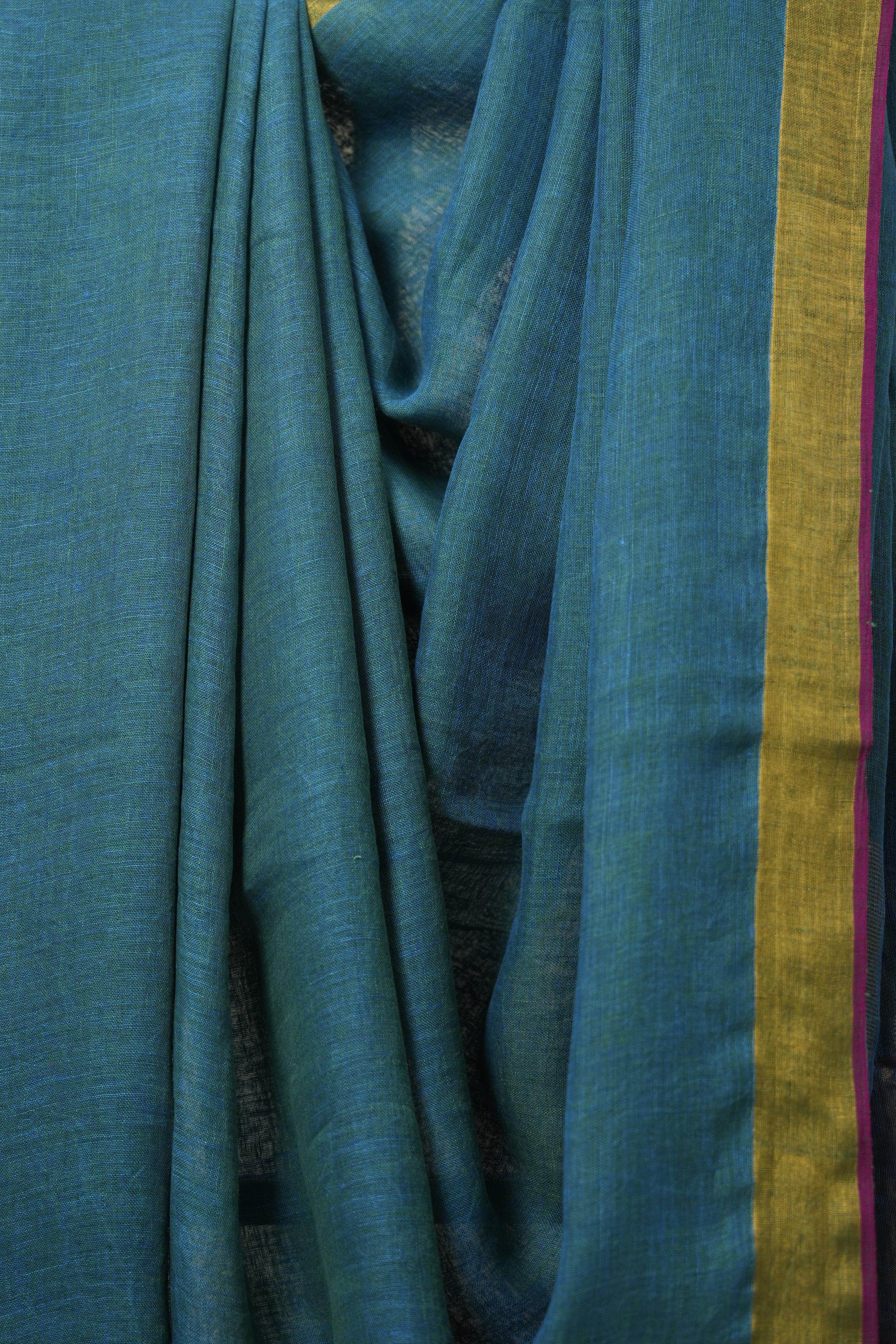 Peacock Green Plain Linen Saree With Pink Tassels - SRPGPLS341