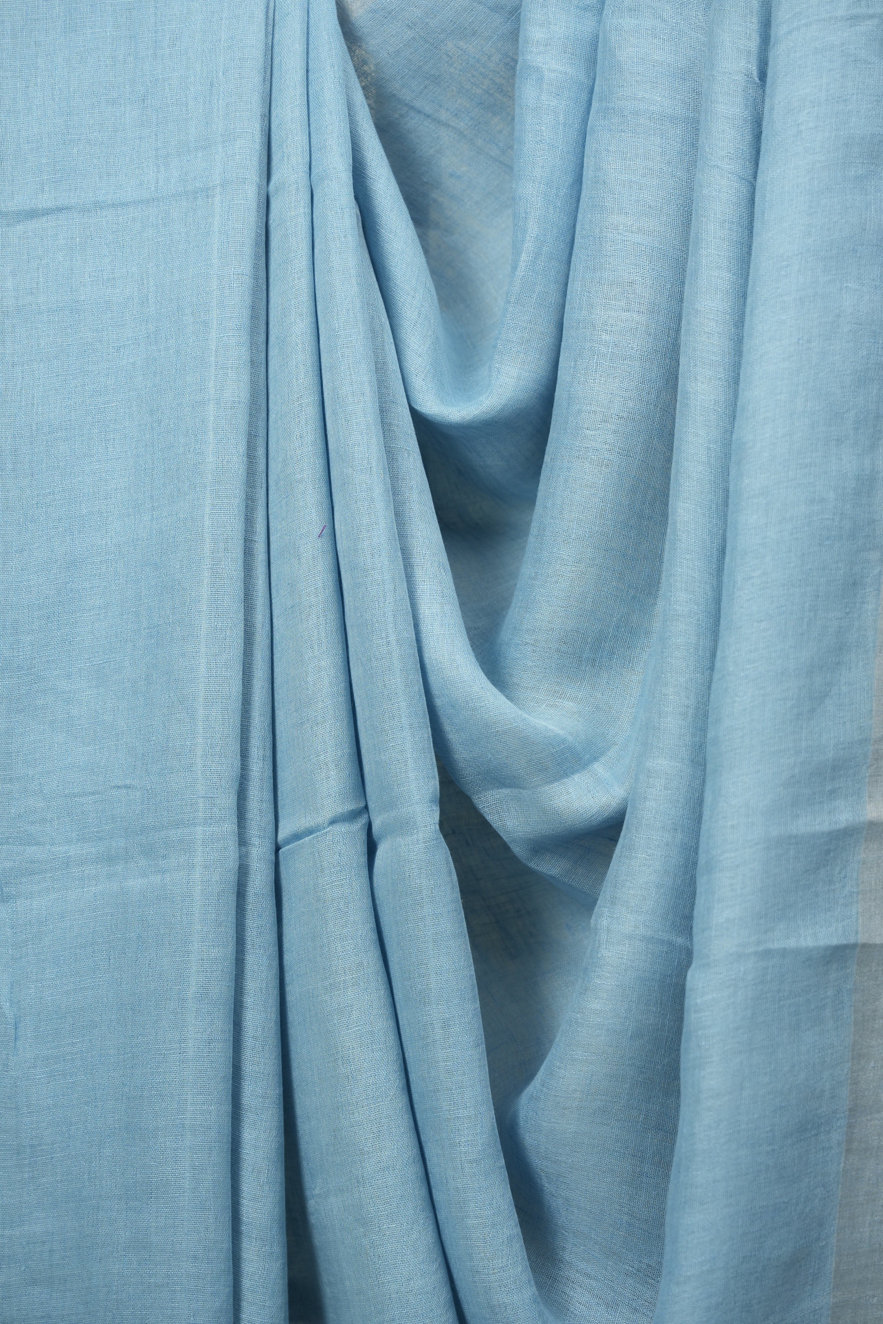 Sky Blue Plain Linen Saree With Pink Tassels - SRSBPLS529