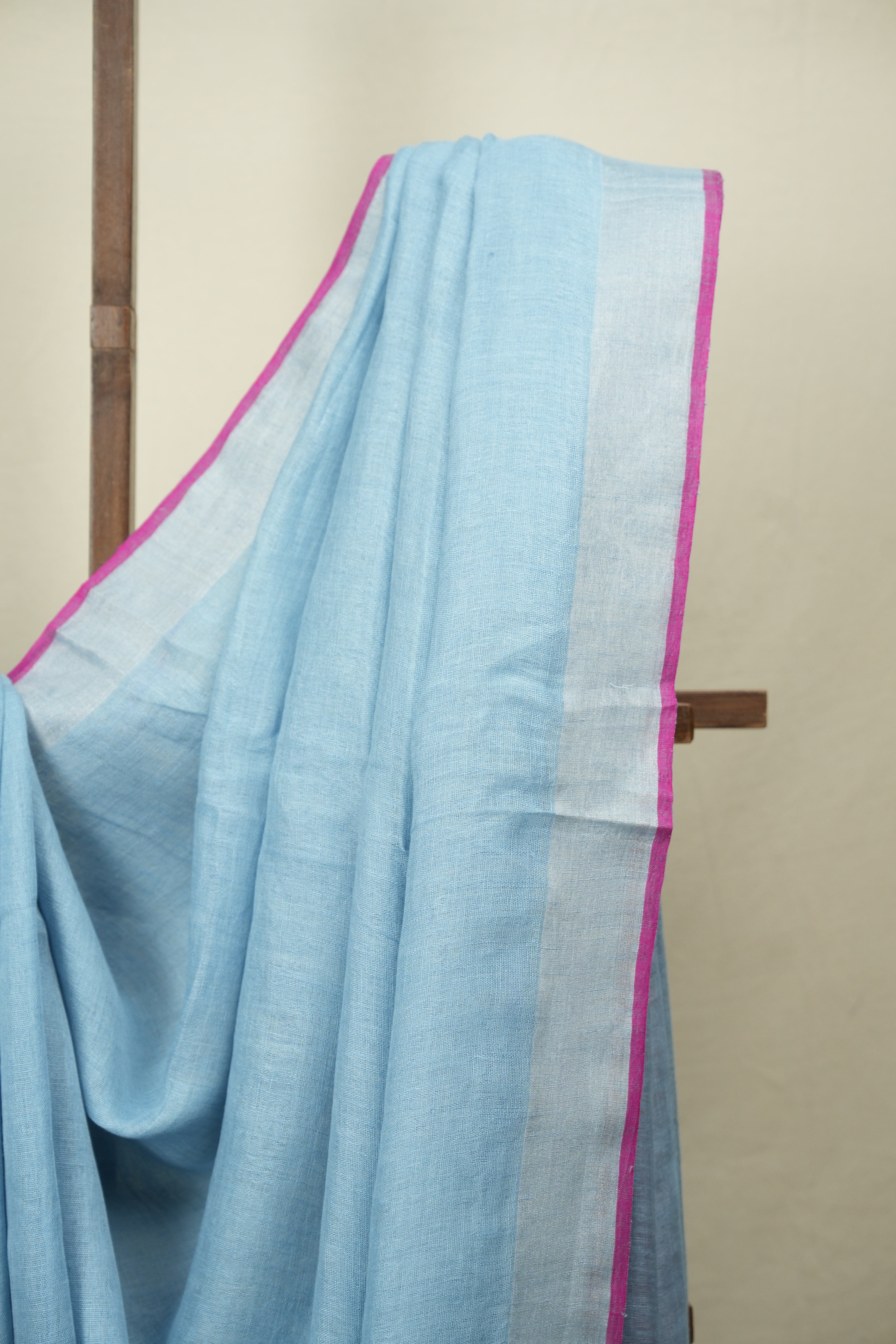 Sky Blue Plain Linen Saree With Pink Tassels - SRSBPLS529