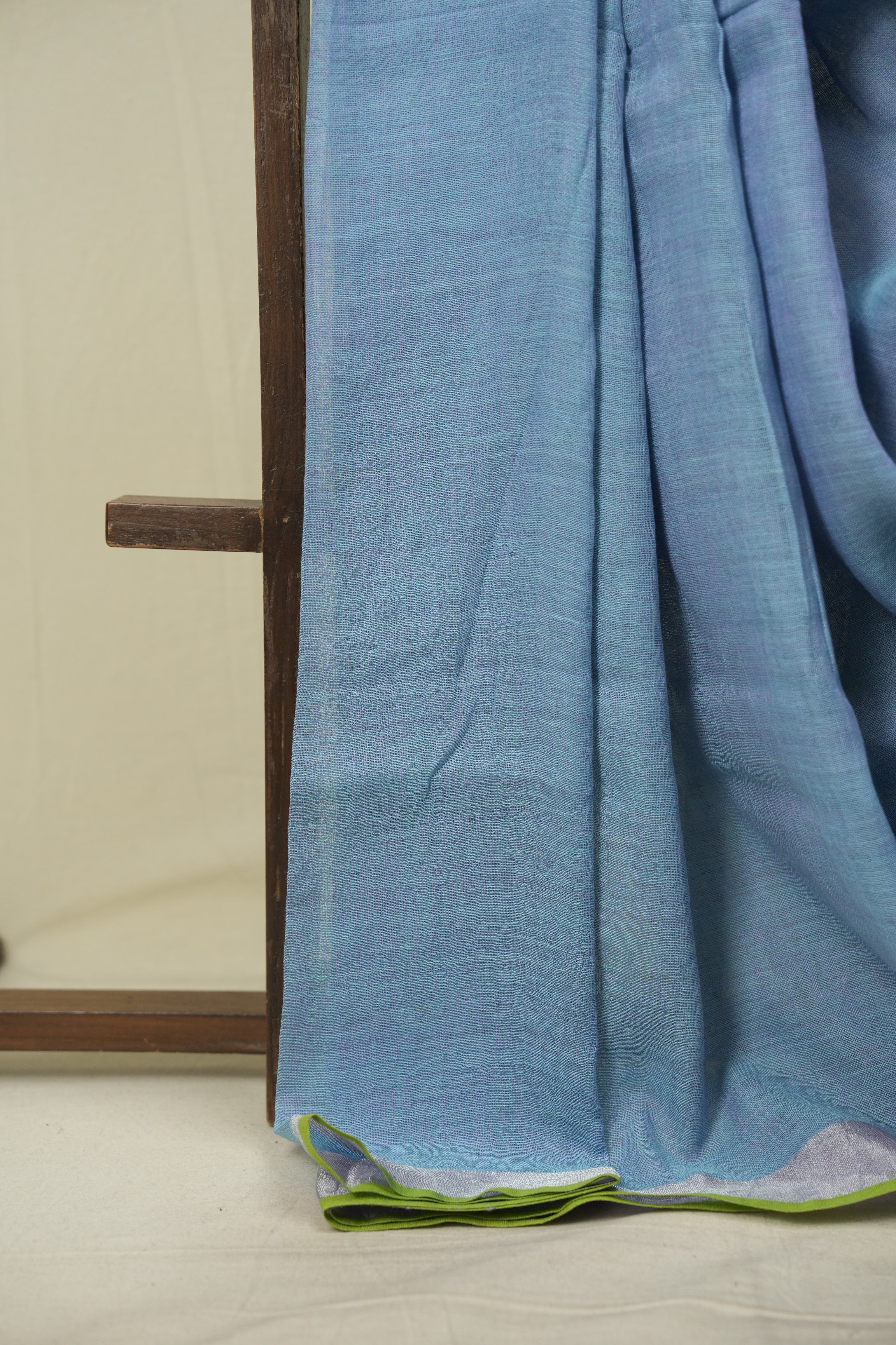 Turquoise Plain Linen Saree With Green Tassels - SRTPLS533