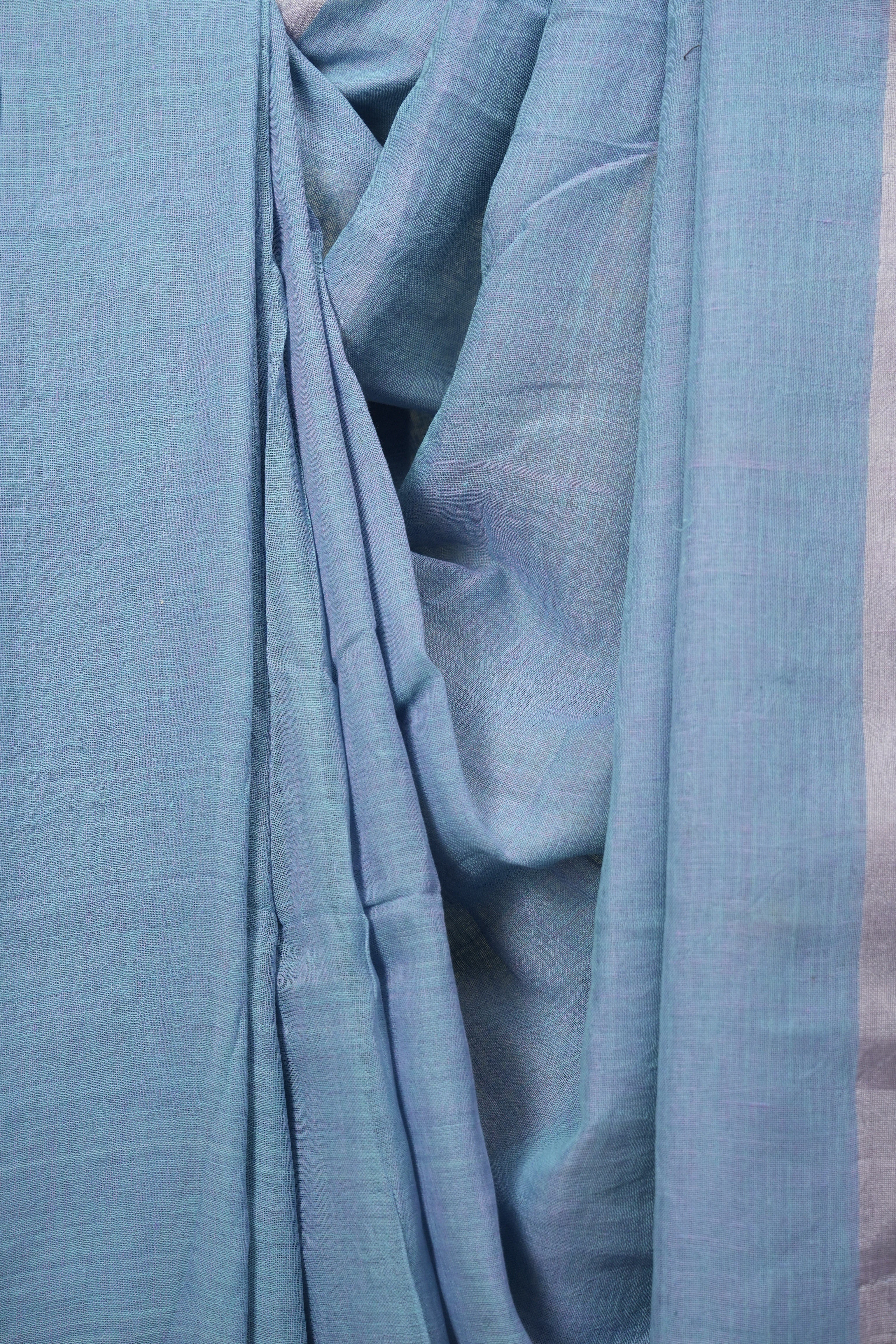 Turquoise Plain Linen Saree With Green Tassels - SRTPLS533