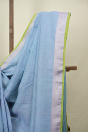 Turquoise Plain Linen Saree With Green Tassels - SRTPLS533