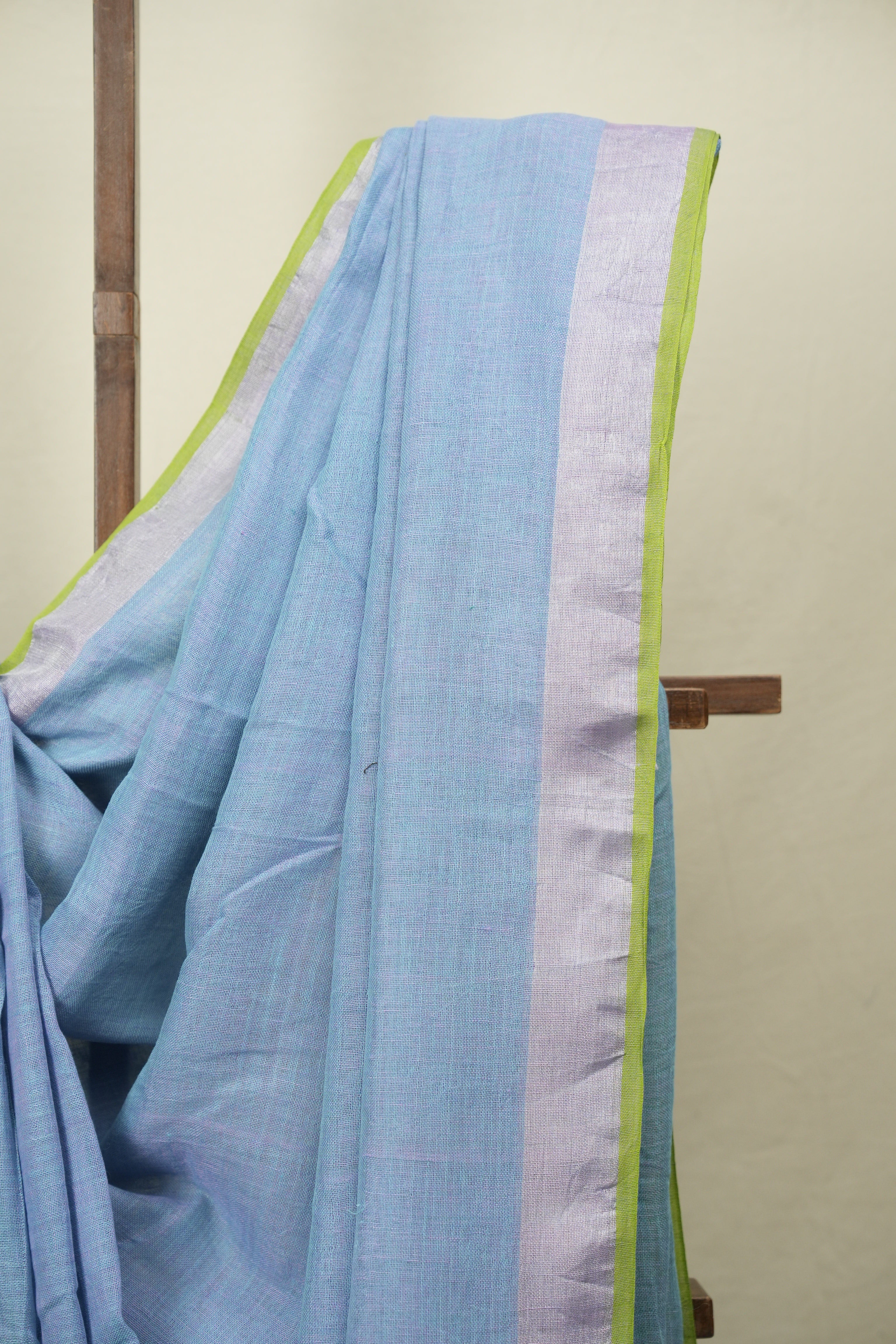 Turquoise Plain Linen Saree With Green Tassels - SRTPLS533