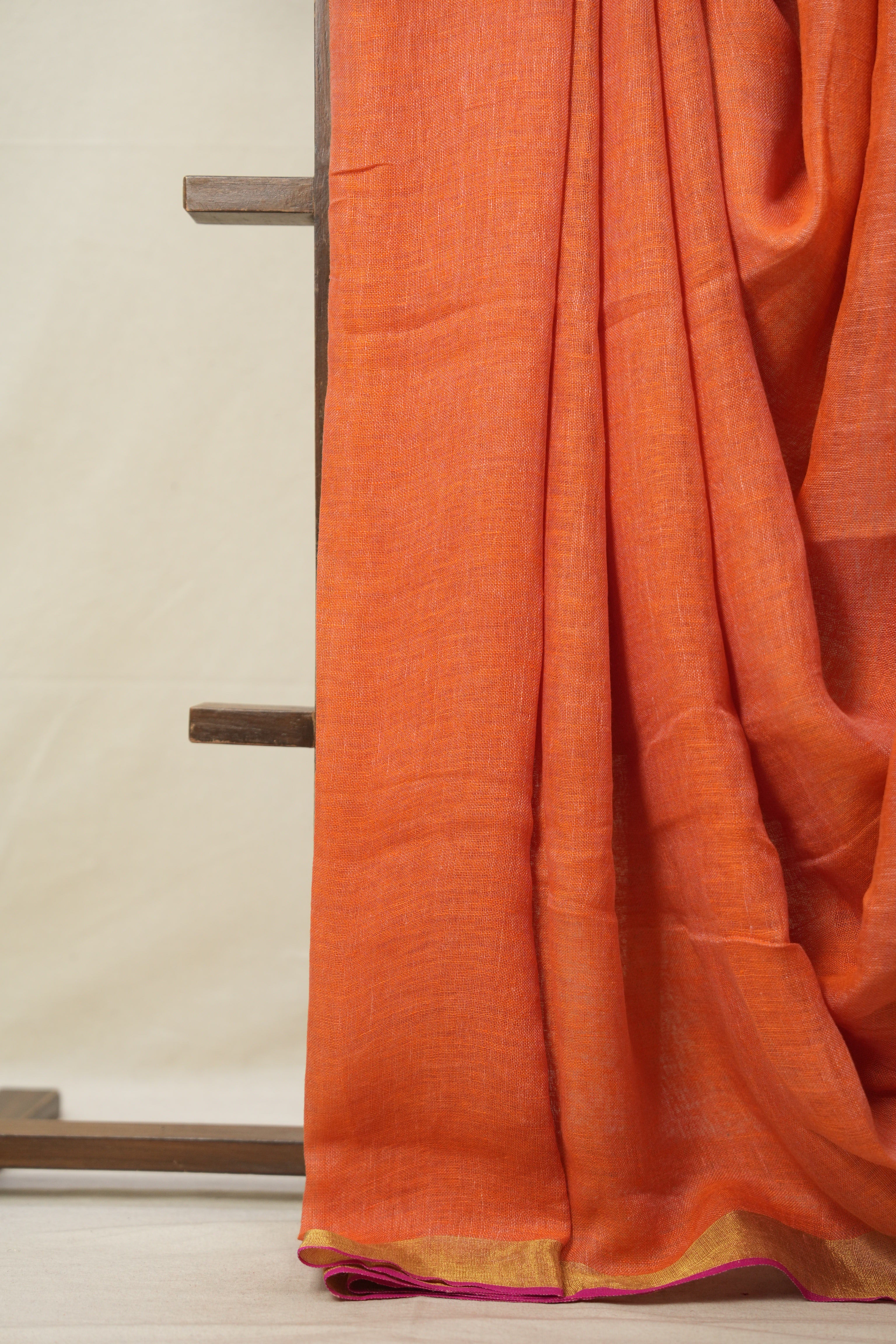 Orange Plain Linen Saree With Pink Tassels - SROPLS527