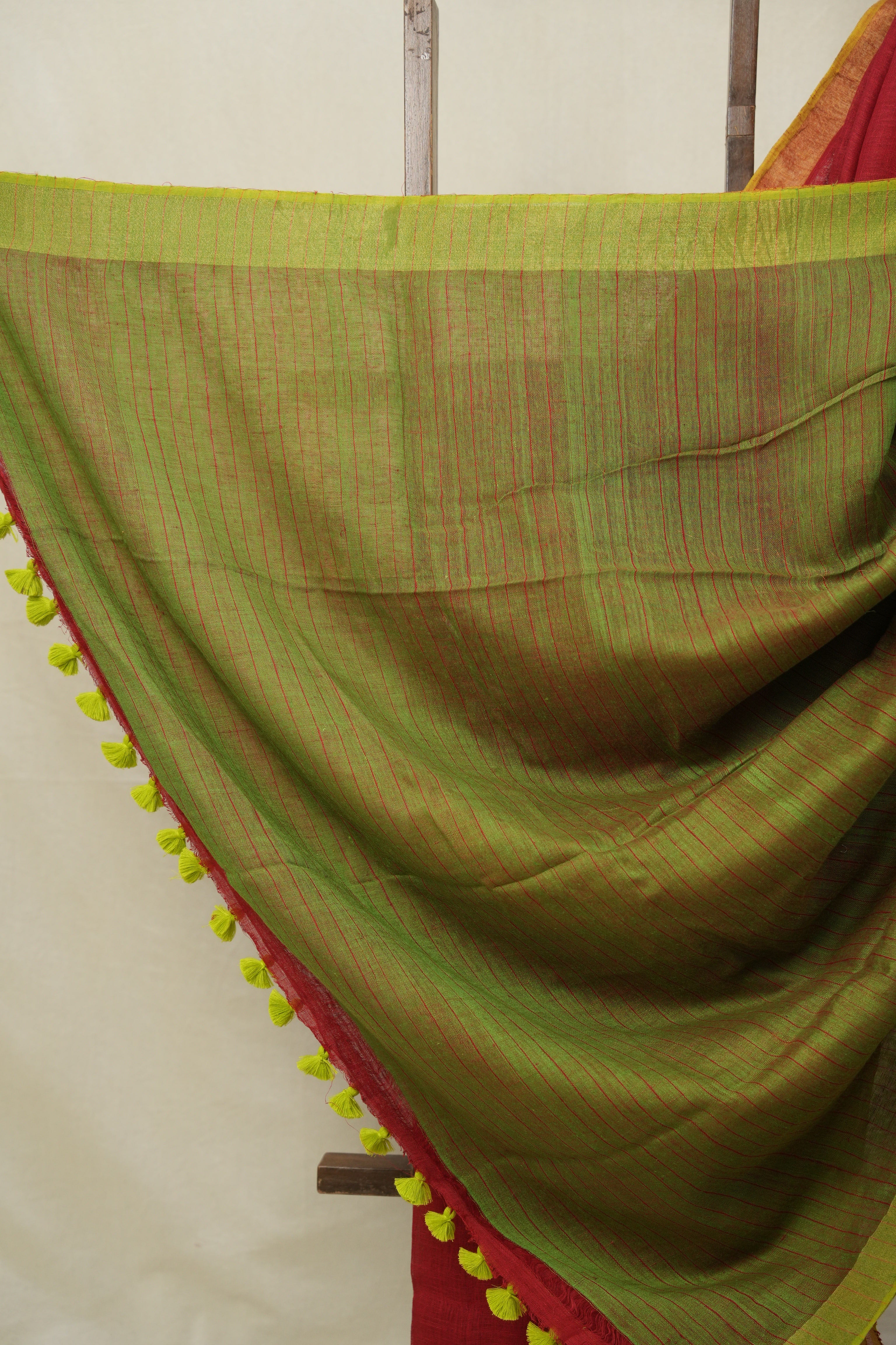 Red Plain Linen Saree With Green Tassels - SRRPLS526