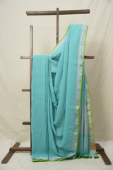 Aqua Plain Linen Saree With Parrot Green Tassels - SRAPLSWPGT344