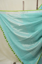 Aqua Plain Linen Saree With Parrot Green Tassels - SRAPLSWPGT344