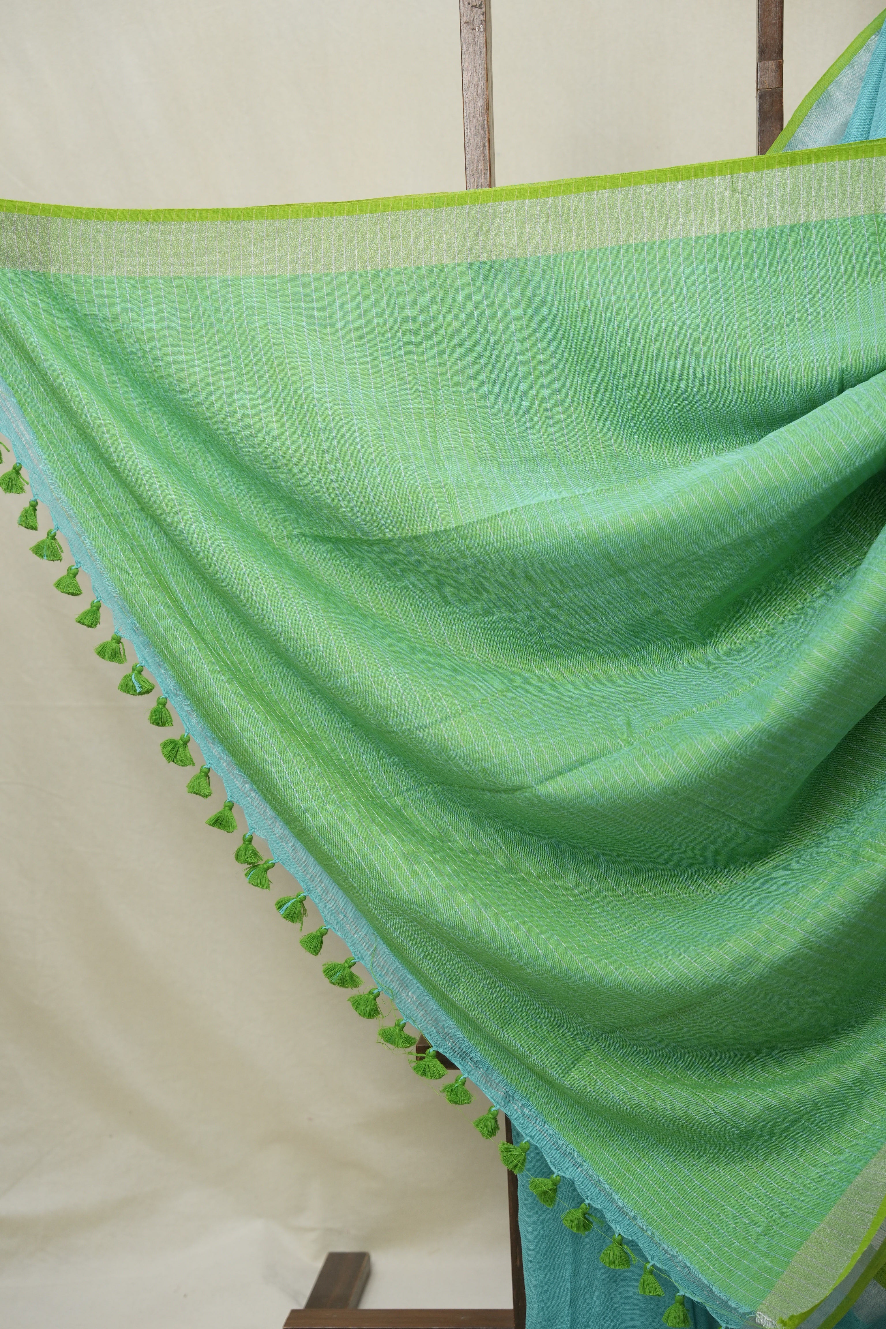 Aqua Plain Linen Saree With Parrot Green Tassels - SRAPLSWPGT344