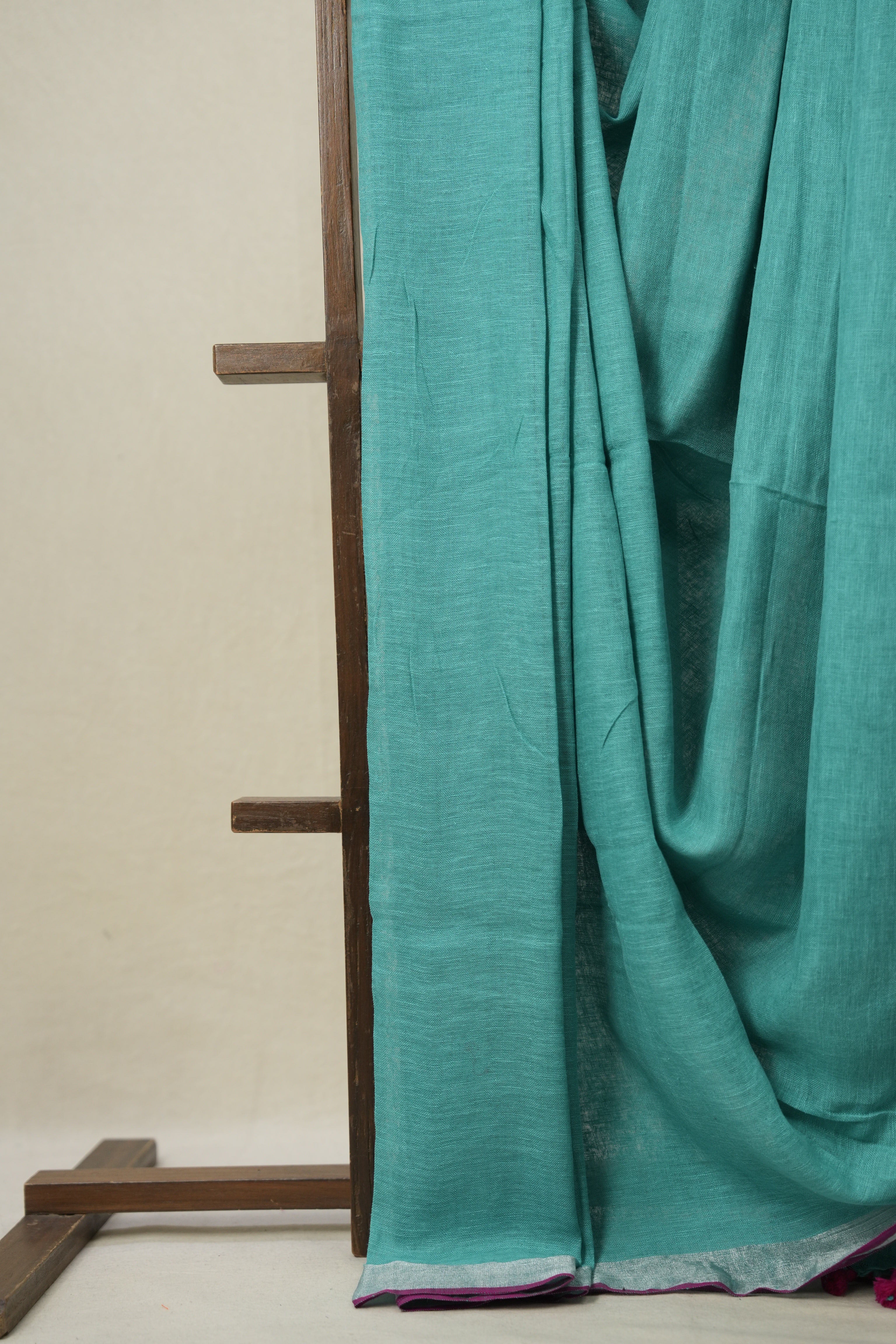 Aqua Plain Linen Saree With Pink Tassels -SRAPLS464