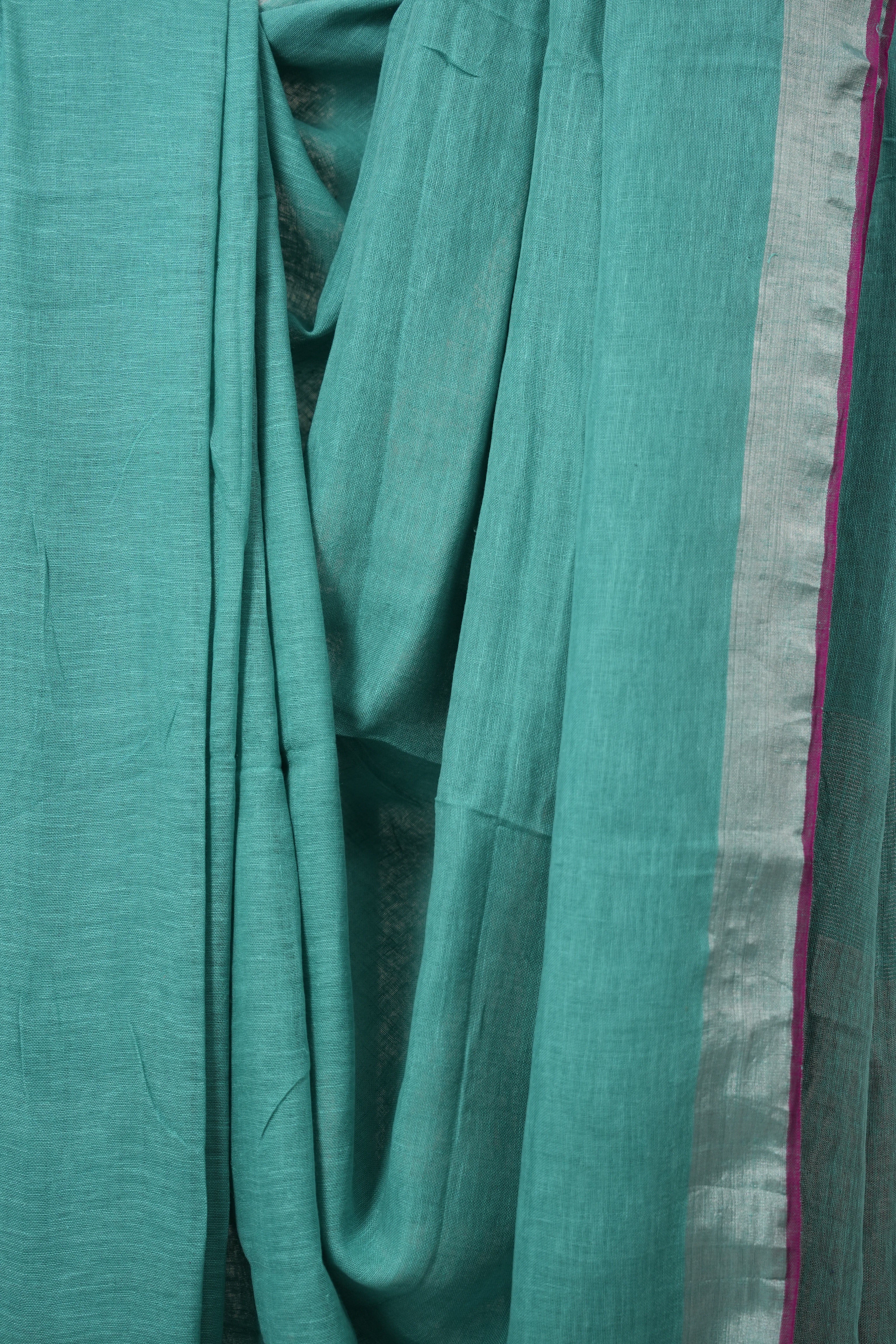 Aqua Plain Linen Saree With Pink Tassels -SRAPLS464