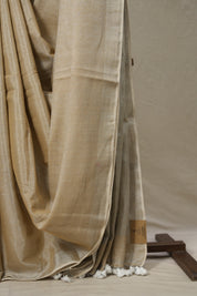 Metallic Beige Tissue Linen Saree With Tassels - SRMBTLS273