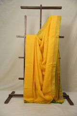Yellow Plain Linen Saree With Green Tassels - SRYPLS330