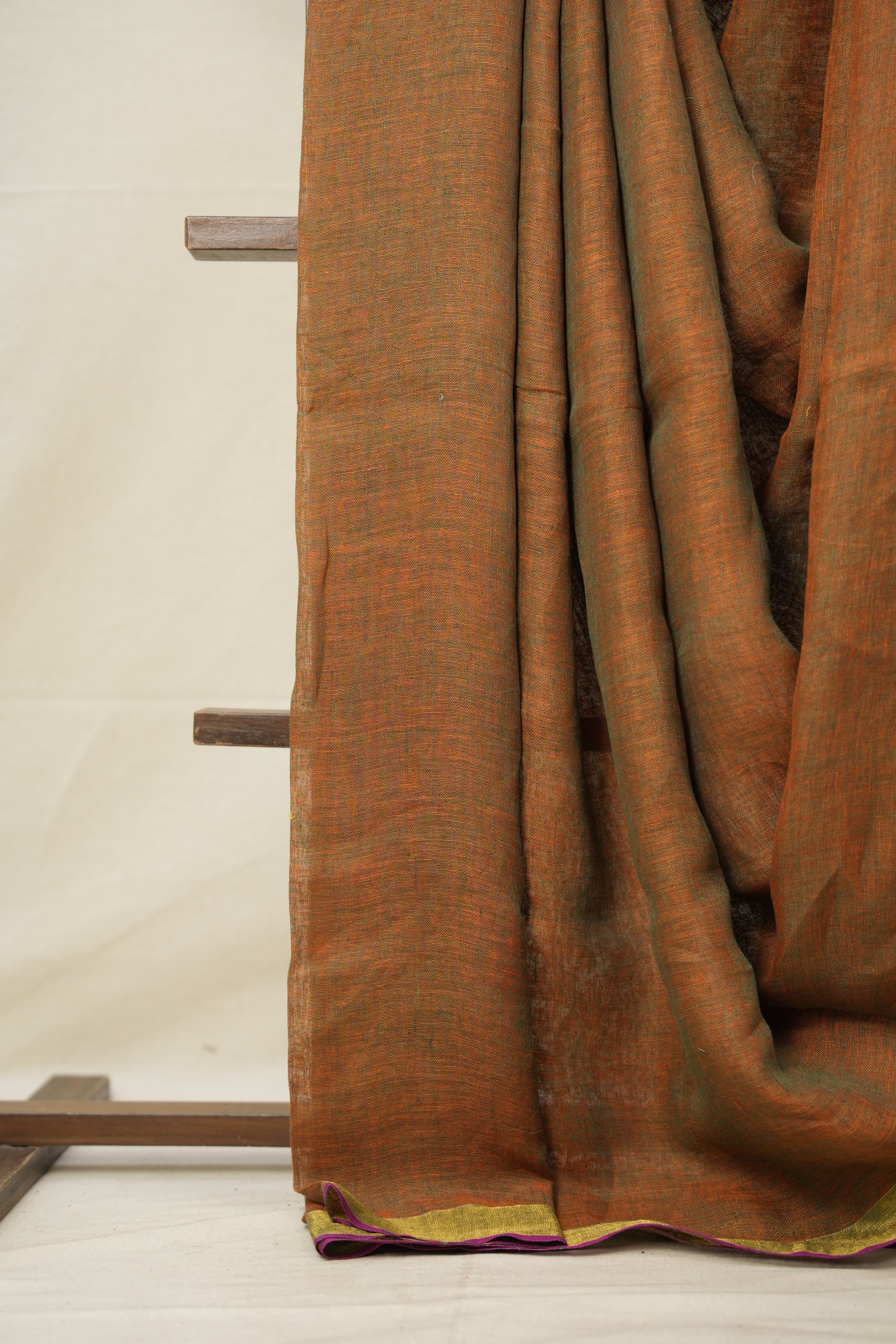 Orange Plain Linen Saree With Pink Tassels - SROPLS335