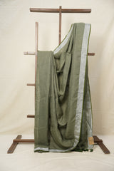 Powder Green Plain Linen Saree With Green Tassels - SRPGPLS334