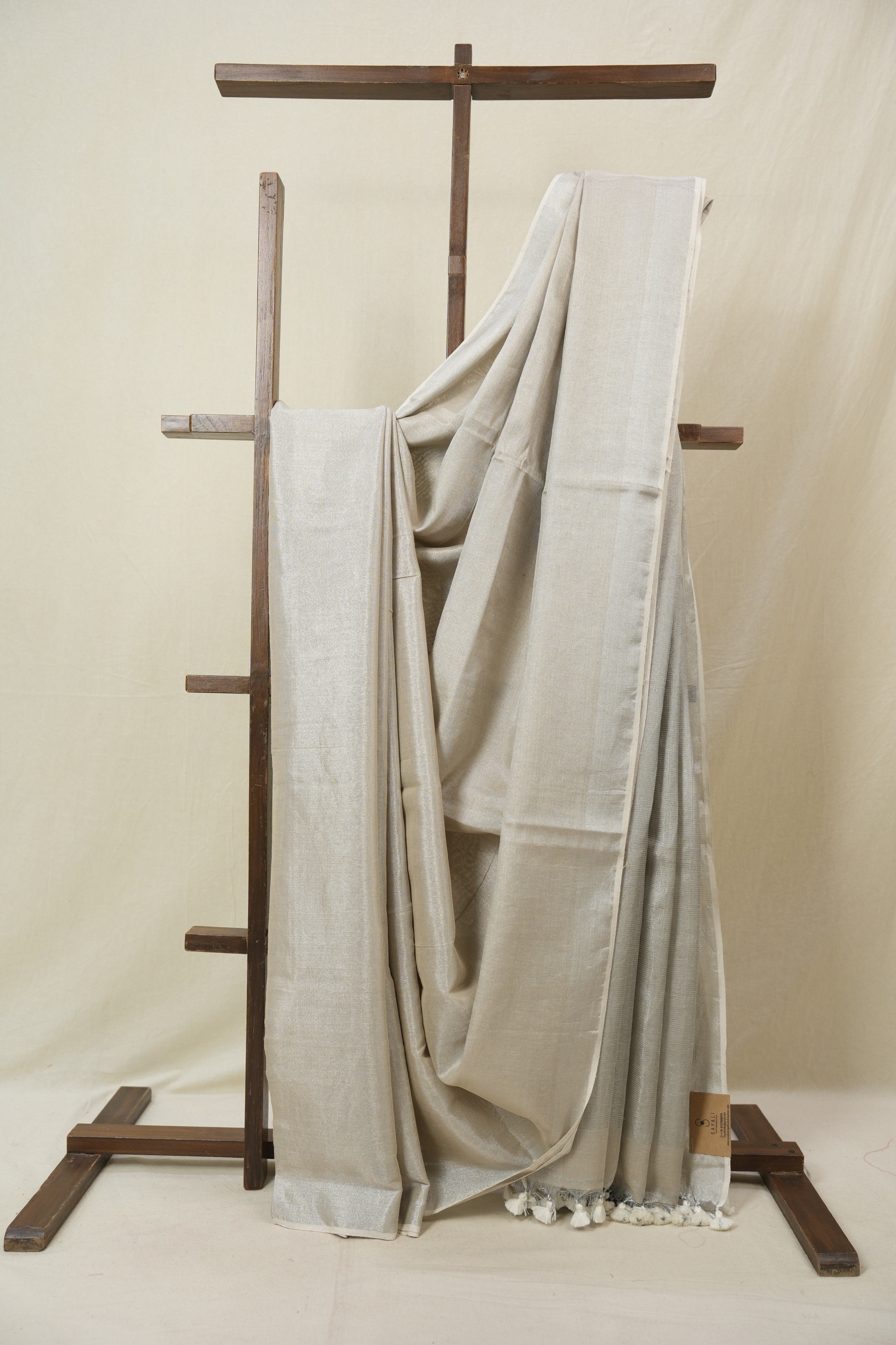 Ivory Plain Tissue Linen Saree With Tassels - SRIPTLS299