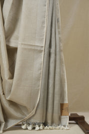 Ivory Plain Tissue Linen Saree With Tassels - SRIPTLS299