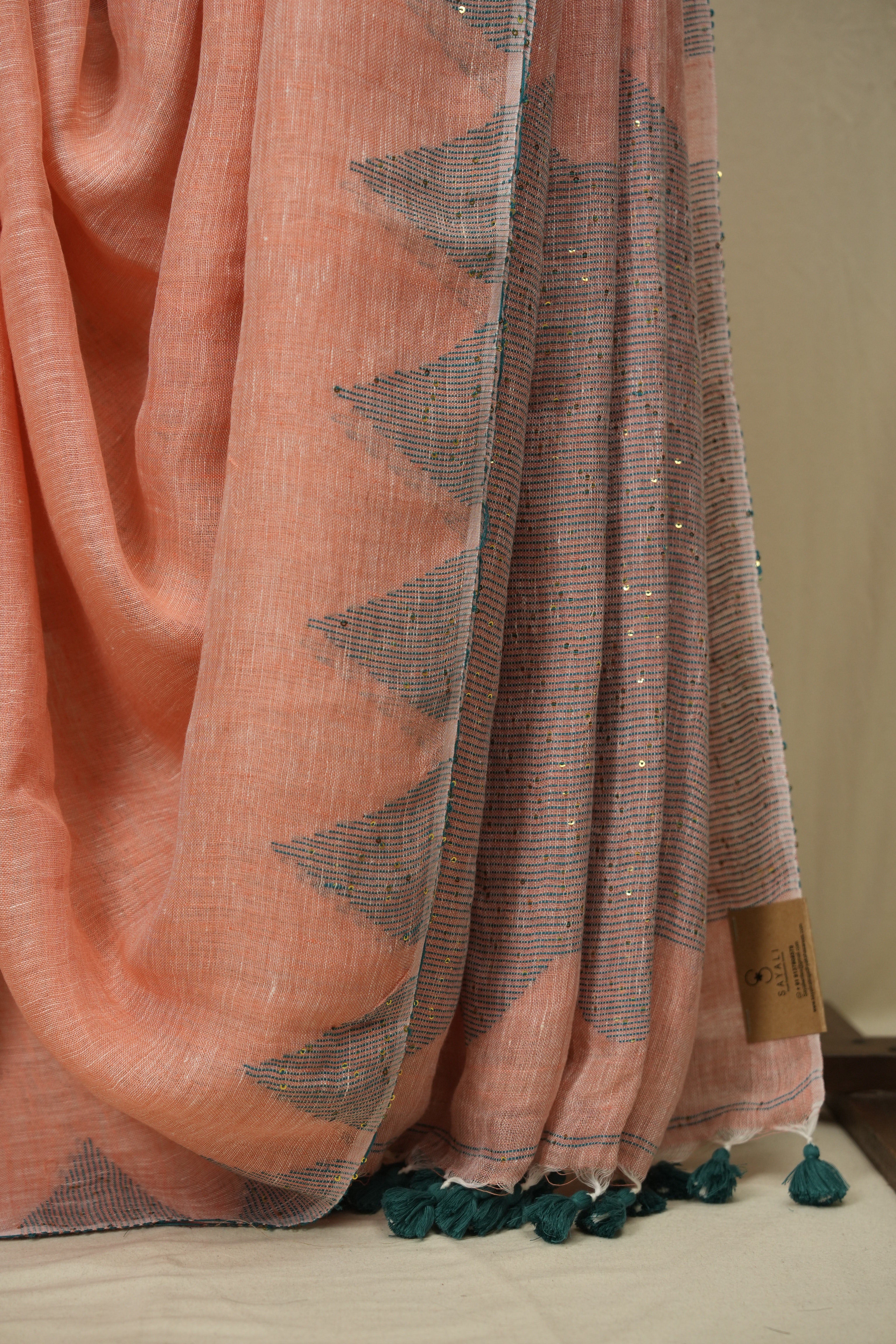 Peach Sequins Linen Saree With Green Tassels - SRPSLS511