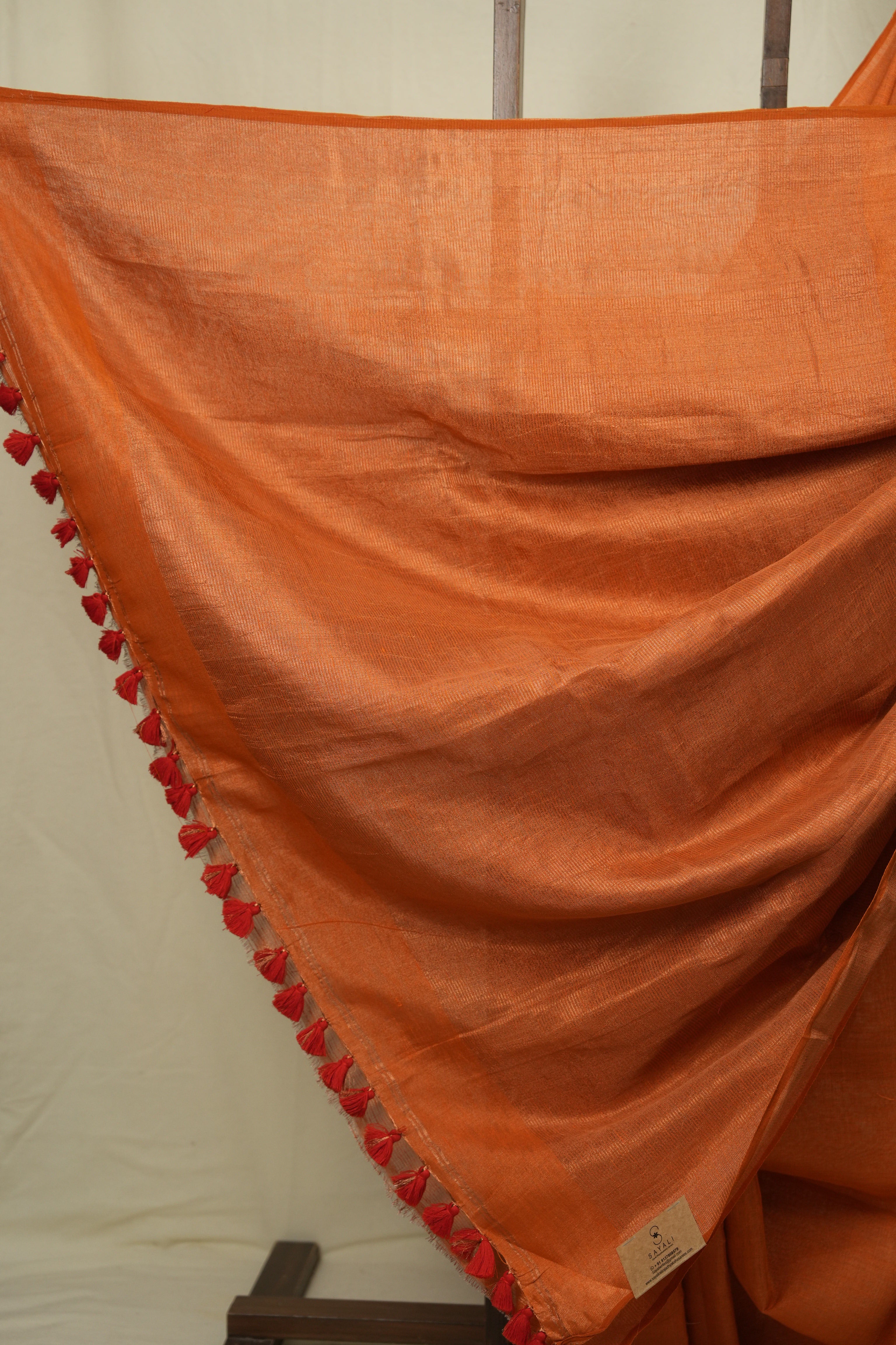 Orange Plain Tissue Linen Saree With Tassels - SROPTLS303