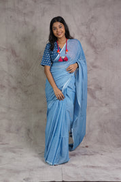 Powder Blue Mul Cotton Saree With Blue Tassels