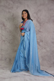 Powder Blue Mul Cotton Saree With Blue Tassels