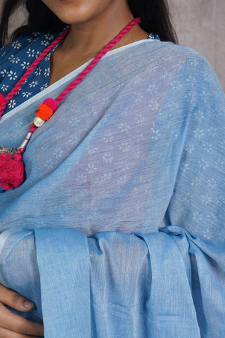 Powder Blue Mul Cotton Saree With Blue Tassels