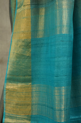 Plain Grey Tussar Silk Saree With Blue Golden Border