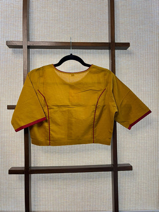 Boat Neck Mustard Yellow Cotton Blouse With Red Piping